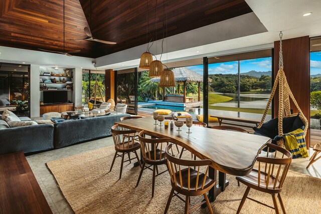 5-1105 Kuhio Hwy Unit A, Kilauea, HI 96754 - dining room featuring wood ceiling, a water and mountain view, recessed lighting, and a ceiling fan