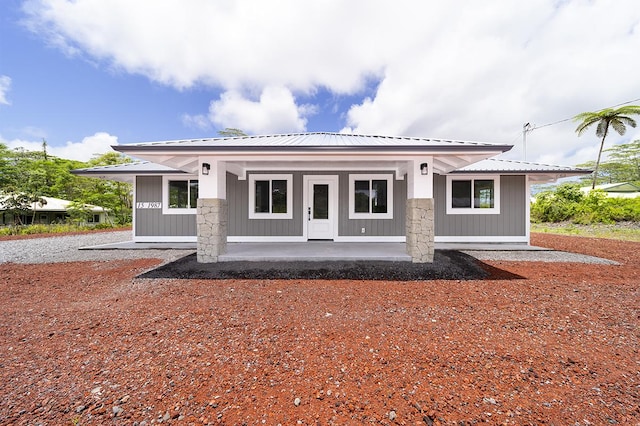 15-1987 27th Ave, Keaau, HI 96749 - back of property with covered porch and a metal roof