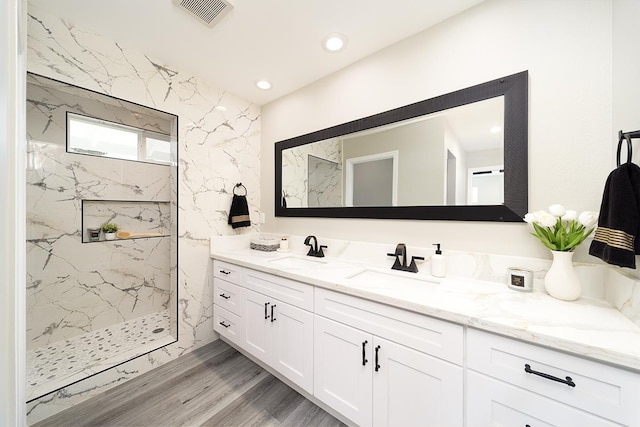 15-1987 27th Ave, Keaau, HI 96749 - full bath featuring double vanity, a marble finish shower, wood finished floors, and recessed lighting