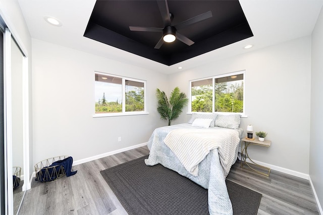 15-1987 27th Ave, Keaau, HI 96749 - bedroom featuring a raised ceiling, wood finished floors, recessed lighting, a ceiling fan, and a closet