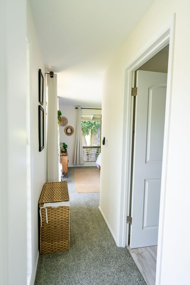 3057 Poipu Rd Unit C10, Koloa, HI 96756 - hallway featuring carpet floors and baseboards