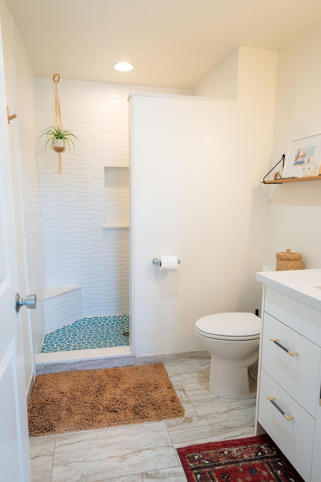 3057 Poipu Rd Unit C10, Koloa, HI 96756 - bathroom featuring a tile shower, vanity, toilet, and recessed lighting