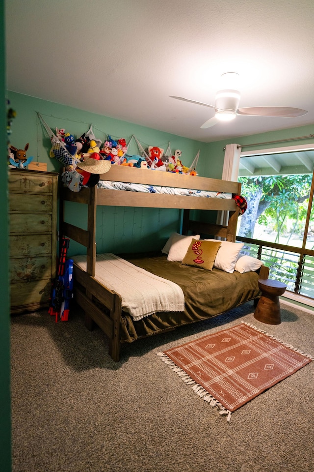 3057 Poipu Rd Unit C10, Koloa, HI 96756 - carpeted bedroom with a ceiling fan