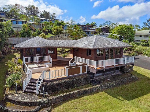 72-981 Puukala Rd, Kailua-Kona, HI 96740 - rear view of property featuring metal roof and a yard