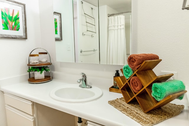 75-5766 Kuakini Hwy Unit 207, Kailua-Kona, HI 96740 - bathroom featuring vanity and a shower with shower curtain