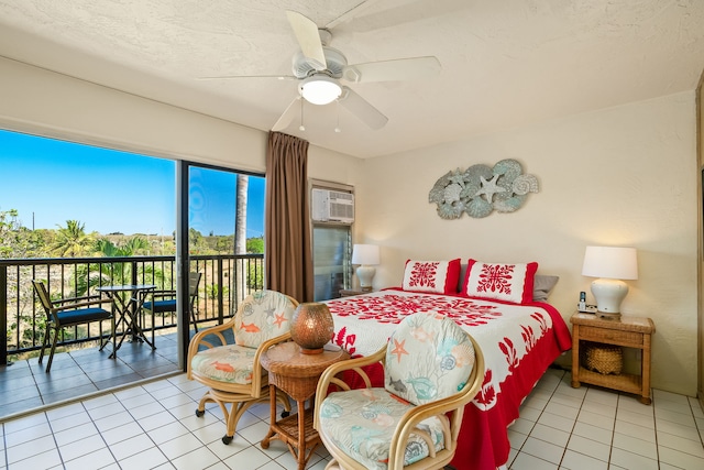 5061 Lawai Rd Unit 333, Koloa, HI 96756 - bedroom with light tile patterned flooring, access to outside, and ceiling fan