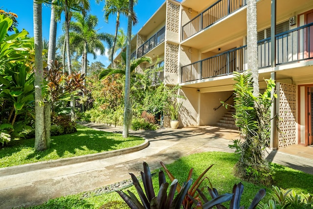 5061 Lawai Rd Unit 333, Koloa, HI 96756 - surrounding community with a lawn