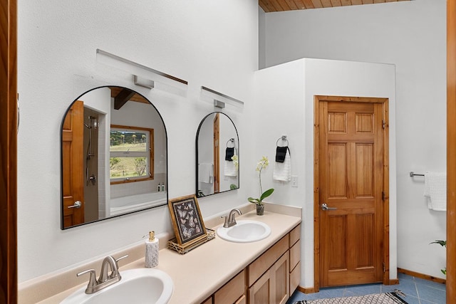 28-811 Akaka Falls Rd, Honomu, HI 96728 - bathroom featuring tile patterned flooring, double vanity, a bath, and lofted ceiling