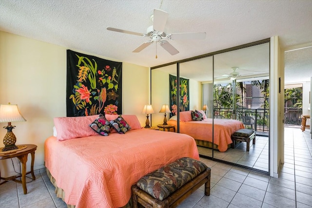 75-6026 Alii Dr Unit 5207, Kailua-Kona, HI 96740 - bedroom with multiple windows, light tile patterned floors, access to exterior, a textured ceiling, and a ceiling fan
