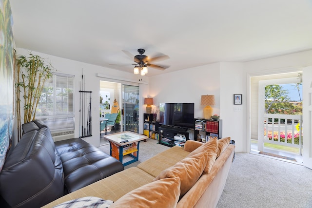 75-6081 Alii Dr Unit B204, Kailua-Kona, HI 96740 - carpeted living area with plenty of natural light and a ceiling fan