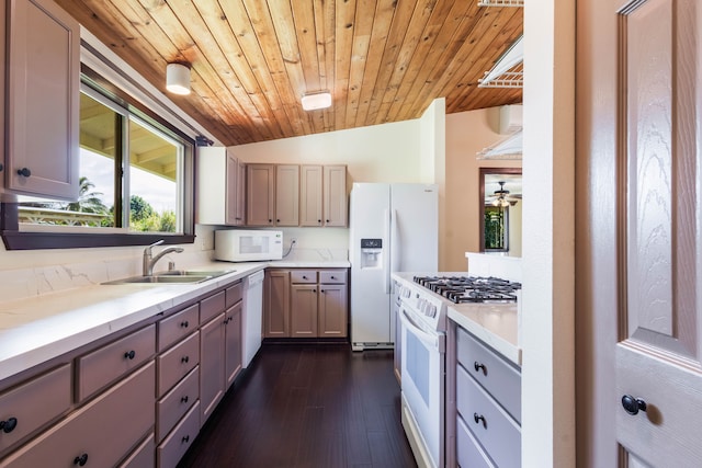 4085-B Noho Rd, Koloa, HI 96756 - kitchen featuring white appliances, a sink, wood ceiling, dark wood-style flooring, and vaulted ceiling