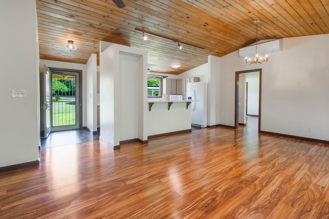 4085-B Noho Rd, Koloa, HI 96756 - unfurnished living room featuring lofted ceiling, a chandelier, wooden ceiling, wood finished floors, and baseboards