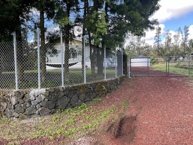 16-2064 Azure Dr, Pahoa, HI 96778 - view of yard with a gate