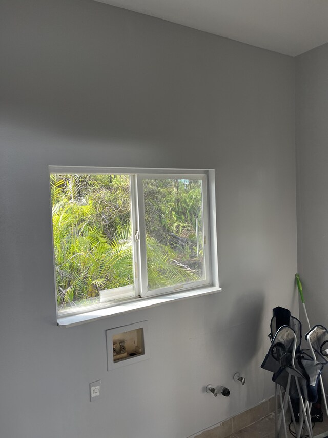 16-2064 Azure Dr, Pahoa, HI 96778 - washroom featuring washer hookup and plenty of natural light