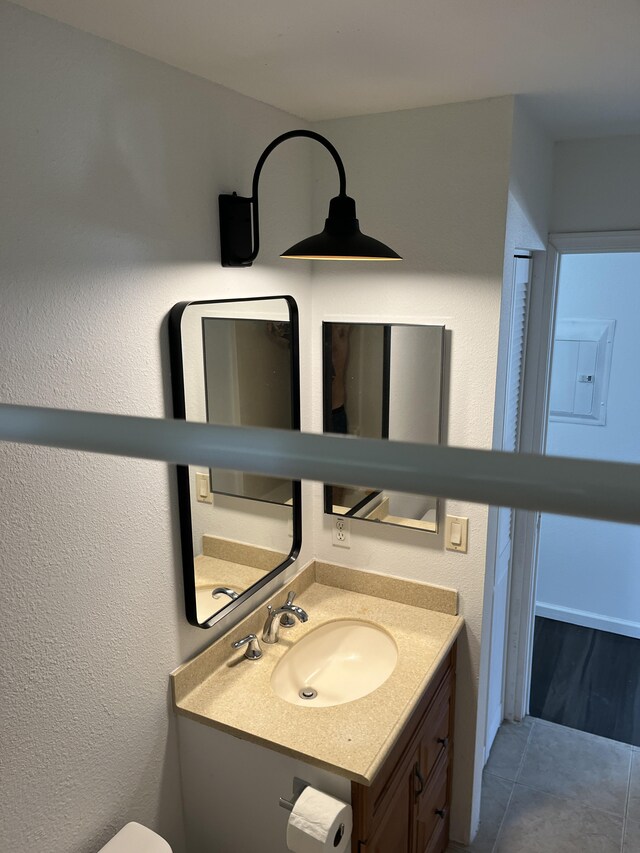 16-2064 Azure Dr, Pahoa, HI 96778 - bathroom featuring vanity, tile patterned floors, and electric panel