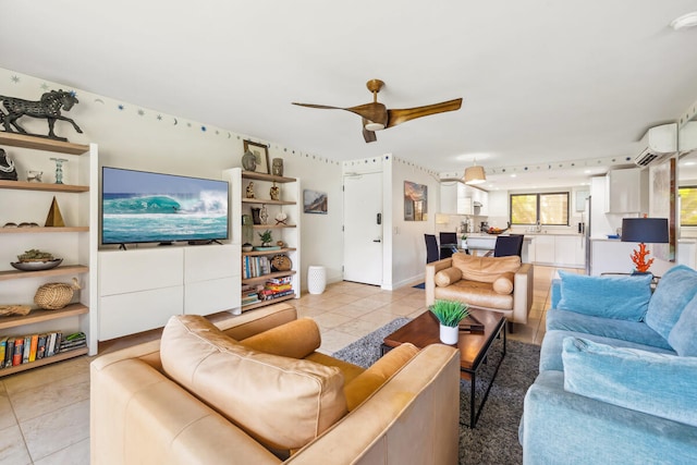 1661 Pee Rd Unit I-204, Koloa, HI 96756 - living area with light tile patterned floors, a wall unit AC, and ceiling fan