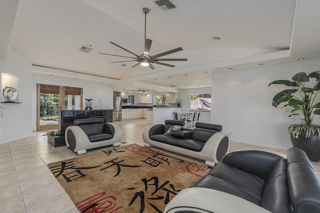 77-6470 Ono Rd, Kailua-Kona, HI 96740 - living room with light tile patterned flooring, plenty of natural light, ceiling fan, and vaulted ceiling