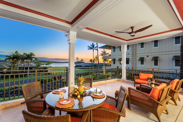 69-1000 Kolea Kai Cir Unit 7E, Waikoloa, HI 96738 - patio terrace at dusk featuring ceiling fan, a balcony, and a water view