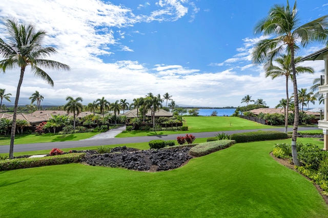 69-1000 Kolea Kai Cir Unit 7E, Waikoloa, HI 96738 - view of community featuring a water view and a lawn
