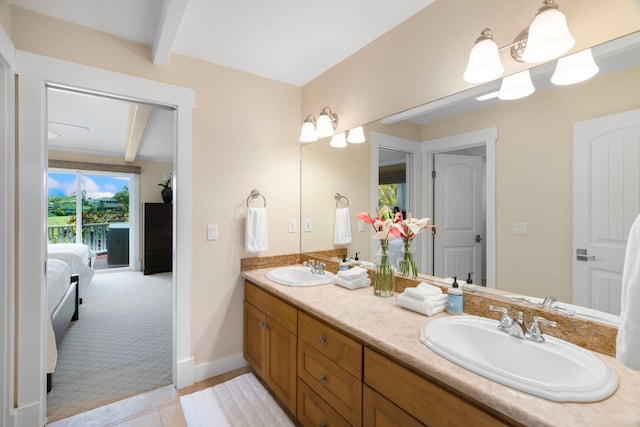 4194 Waileia Pl, Princeville, HI 96722 - bathroom featuring beam ceiling, ensuite bath, double vanity, tile patterned floors, and baseboards