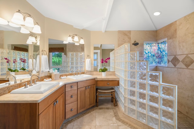 4194 Waileia Pl, Princeville, HI 96722 - bathroom with a walk in shower, double vanity, tile patterned floors, lofted ceiling, and inlaid floor details