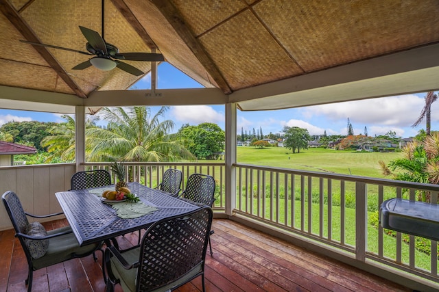 4194 Waileia Pl, Princeville, HI 96722 - wooden terrace with ceiling fan, a yard, and outdoor dining space