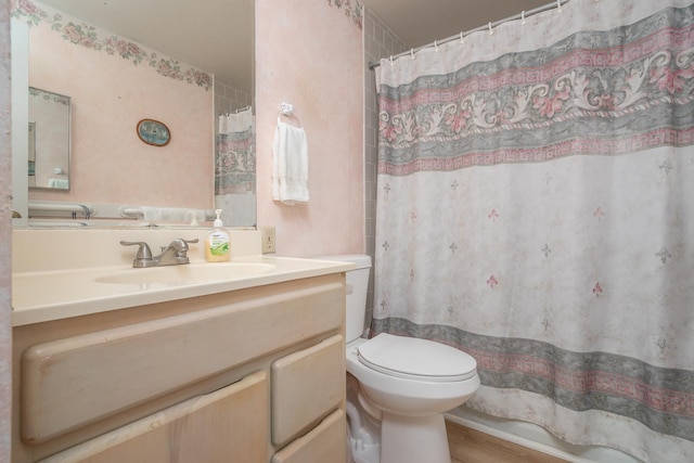 1875 Kalanianaole Ave Unit 409, Hilo, HI 96720 - full bathroom featuring vanity, toilet, and a shower with curtain