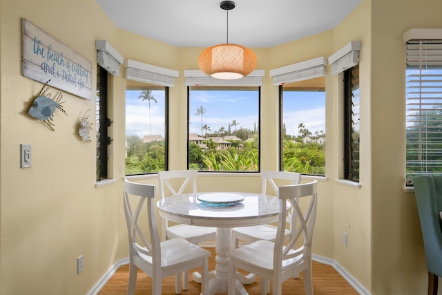 5451 Ka Haku Rd Unit 24, Princeville, HI 96722 - dining room with wood finished floors and baseboards