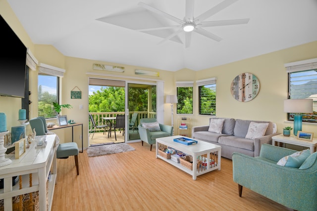 5451 Ka Haku Rd Unit 24, Princeville, HI 96722 - living area with vaulted ceiling, light wood-style flooring, a ceiling fan, and plenty of natural light