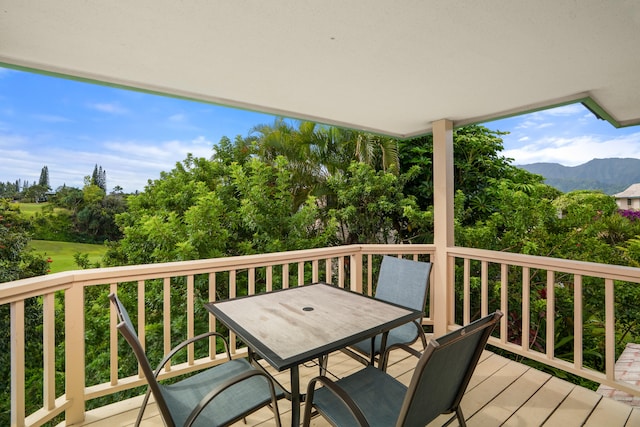 5451 Ka Haku Rd Unit 24, Princeville, HI 96722 - wooden terrace with outdoor dining area