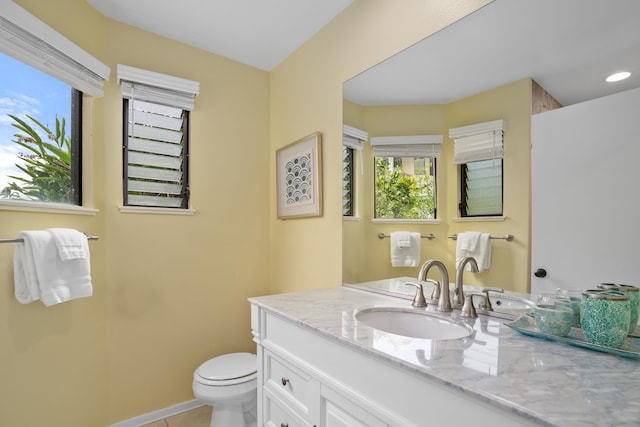 5451 Ka Haku Rd Unit 24, Princeville, HI 96722 - bathroom with vanity, toilet, tile patterned flooring, baseboards, and recessed lighting