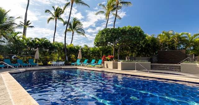 69-1010 Keana Pl Unit F105, Waikoloa, HI 96738 - community pool featuring a patio area
