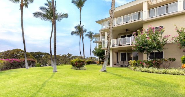 69-1010 Keana Pl Unit F105, Waikoloa, HI 96738 - view of green lawn with a balcony