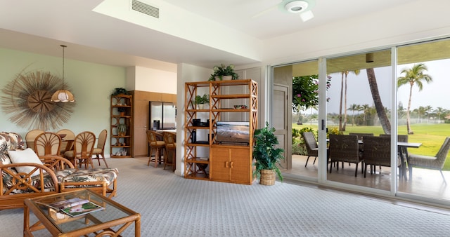 69-1010 Keana Pl Unit F105, Waikoloa, HI 96738 - living room with carpet and a ceiling fan