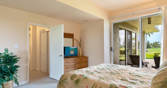 69-1010 Keana Pl Unit F105, Waikoloa, HI 96738 - bedroom featuring access to outside, light carpet, and baseboards
