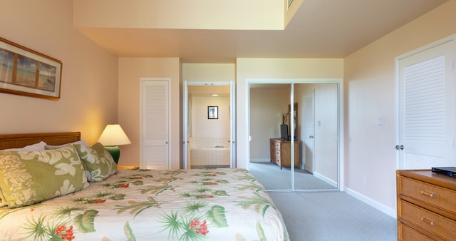 69-1010 Keana Pl Unit F105, Waikoloa, HI 96738 - carpeted bedroom with baseboards and ensuite bath