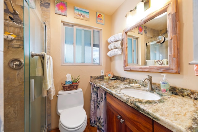 78-6655 Alii Dr, Kailua-Kona, HI 96740 - bathroom with vanity, a shower stall, and toilet