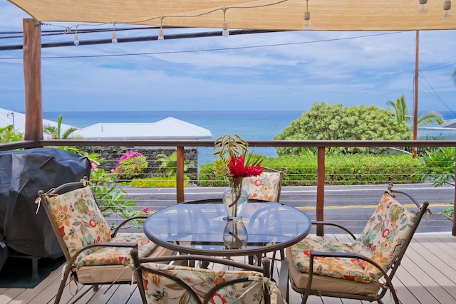 78-6655 Alii Dr, Kailua-Kona, HI 96740 - wooden deck with a water view and outdoor dining space
