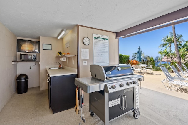 77-305 Kalani Way Unit 6, Kailua-Kona, HI 96740 - view of patio / terrace with area for grilling and a sink