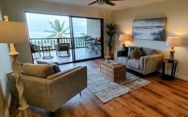 77-305 Kalani Way Unit 6, Kailua-Kona, HI 96740 - living room with wood finished floors, ceiling fan, and baseboards