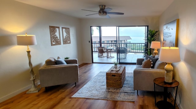 77-305 Kalani Way Unit 6, Kailua-Kona, HI 96740 - living area with ceiling fan, wood finished floors, and baseboards