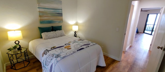 77-305 Kalani Way Unit 6, Kailua-Kona, HI 96740 - bedroom with wood finished floors and baseboards