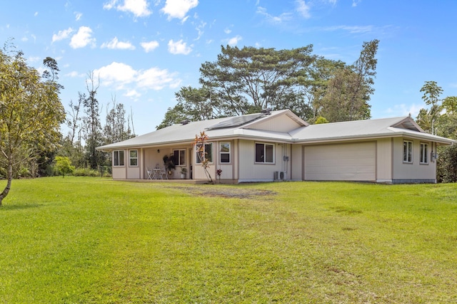 15-2060 29th Ave, Keaau, HI 96749 - rear view of property with an attached garage and a yard