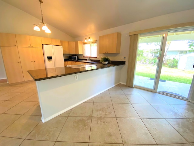 15-1676 6th Ave, Keaau, HI 96749 - kitchen featuring white refrigerator with ice dispenser, a peninsula, light tile patterned floors, lofted ceiling, and hanging light fixtures