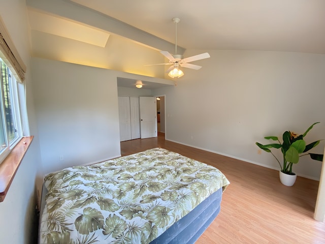 15-1676 6th Ave, Keaau, HI 96749 - bedroom with wood finished floors, baseboards, a skylight, and ceiling fan