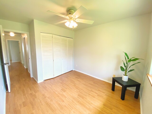 15-1676 6th Ave, Keaau, HI 96749 - unfurnished bedroom featuring light wood-style flooring, baseboards, a closet, and ceiling fan