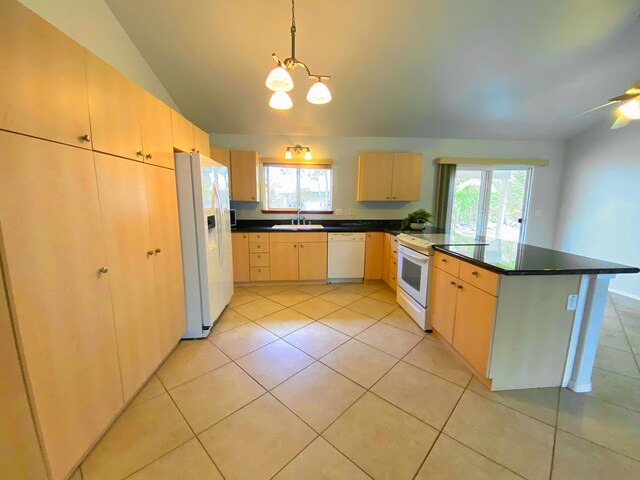 15-1676 6th Ave, Keaau, HI 96749 - kitchen with white appliances, a sink, a peninsula, dark countertops, and light brown cabinetry