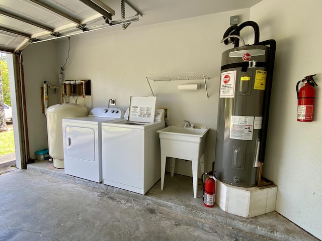 15-1676 6th Ave, Keaau, HI 96749 - laundry area featuring separate washer and dryer, electric water heater, and a garage