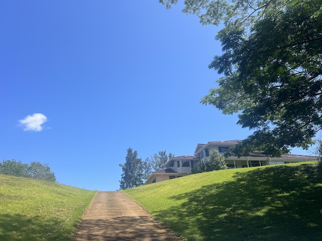 5370 Kaehulua Rd, Kapaa, HI 96746 - view of home's community featuring a lawn