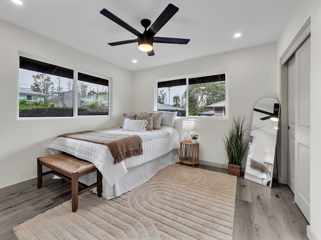 16-2112 Tangerine Dr, Pahoa, HI 96778 - bedroom with wood finished floors, recessed lighting, ceiling fan, and baseboards